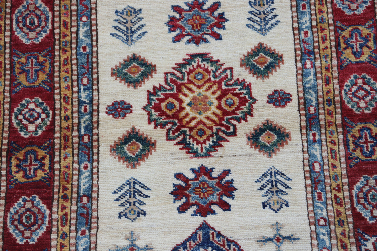 Detail 4 of beige floral Super Kazak cotton-and-wool rug, 2.5 x 4 ft
