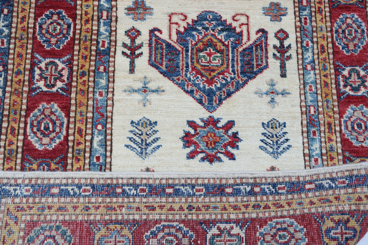 Detail 6 of beige floral Super Kazak cotton-and-wool rug, 2.5 x 4 ft