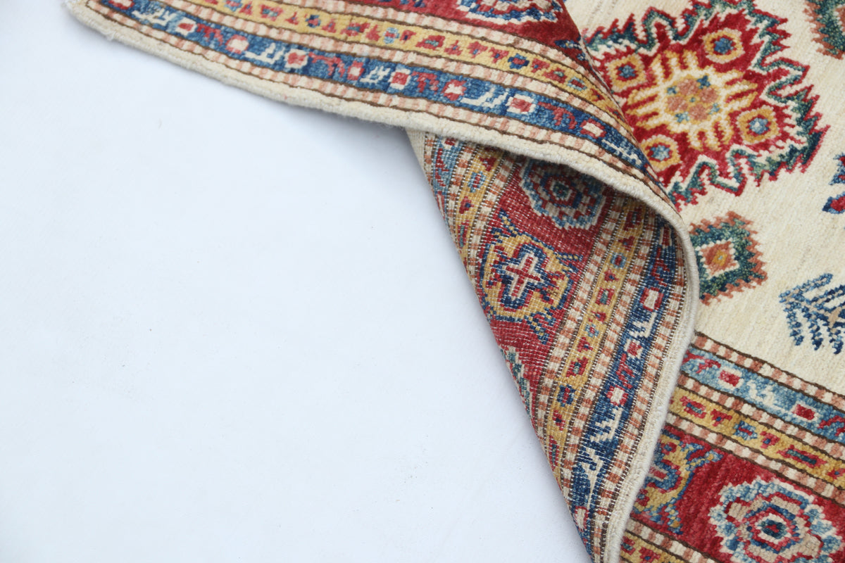 Detail 9 of beige floral Super Kazak cotton-and-wool rug, 2.5 x 4 ft