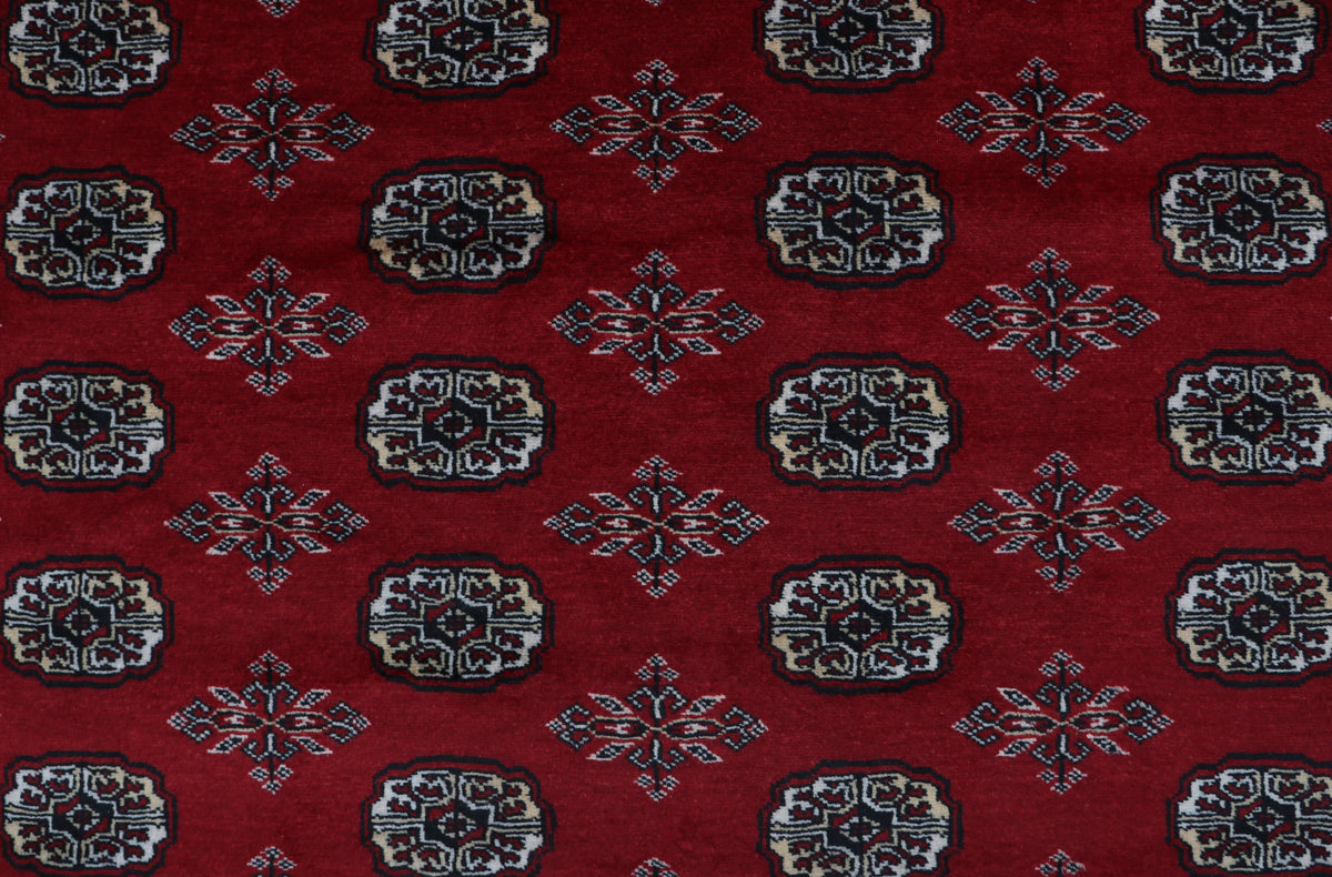 Detail view 4 of red Mori Bokhara handwoven wool rug, 7 x 10 ft
