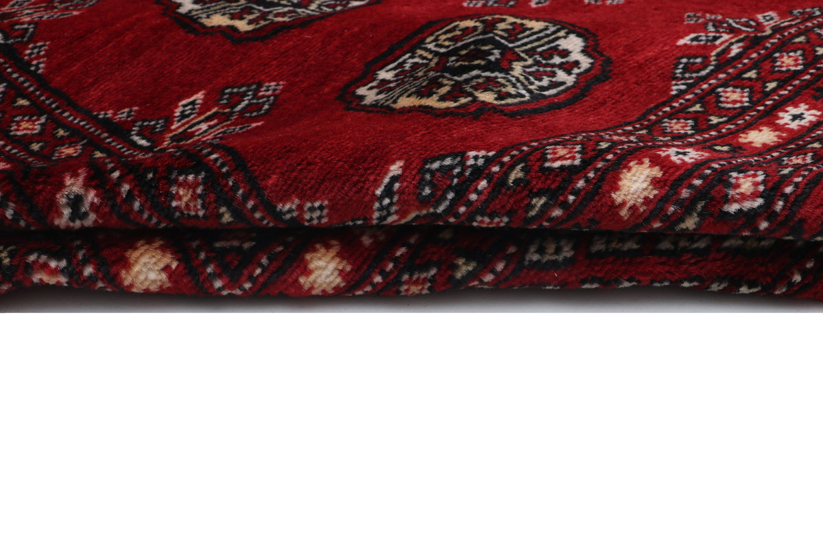 Detail view 7 of red Mori Bokhara handwoven wool rug, 7 x 10 ft