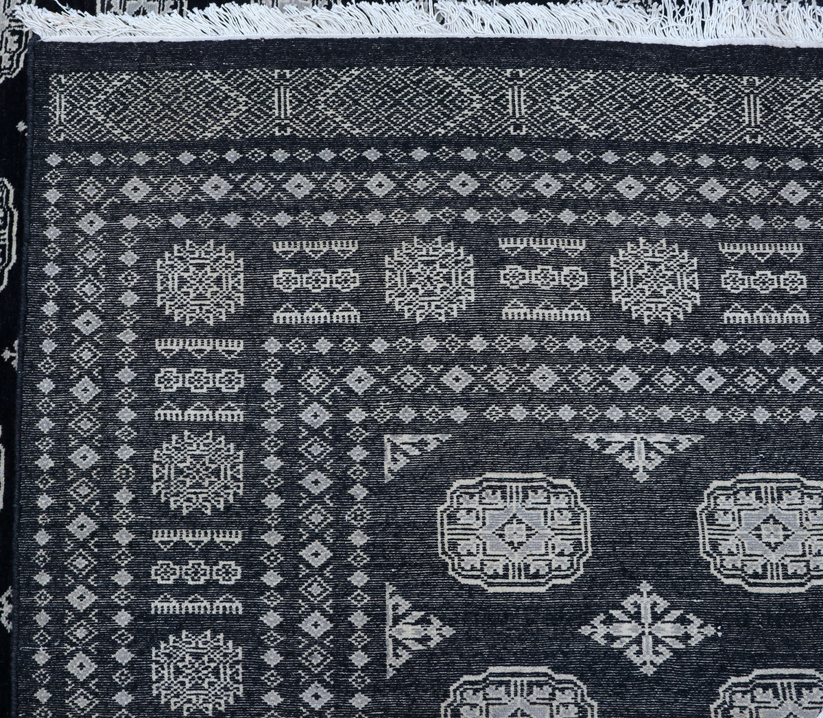 Detail view 7 of black Mori Bokhara handwoven wool rug, 7 x 10 ft