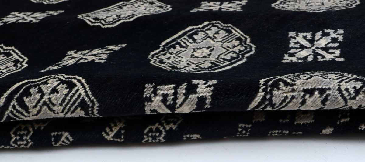 Detail view 8 of black Mori Bokhara handwoven wool rug, 7 x 10 ft