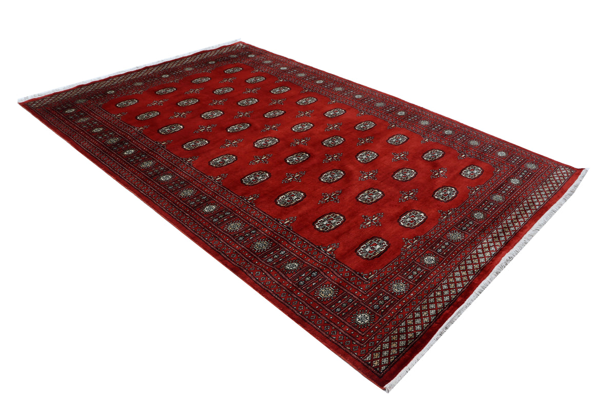 Detail view 3 of red Mori Bokhara handwoven wool rug, 7 x 10 ft