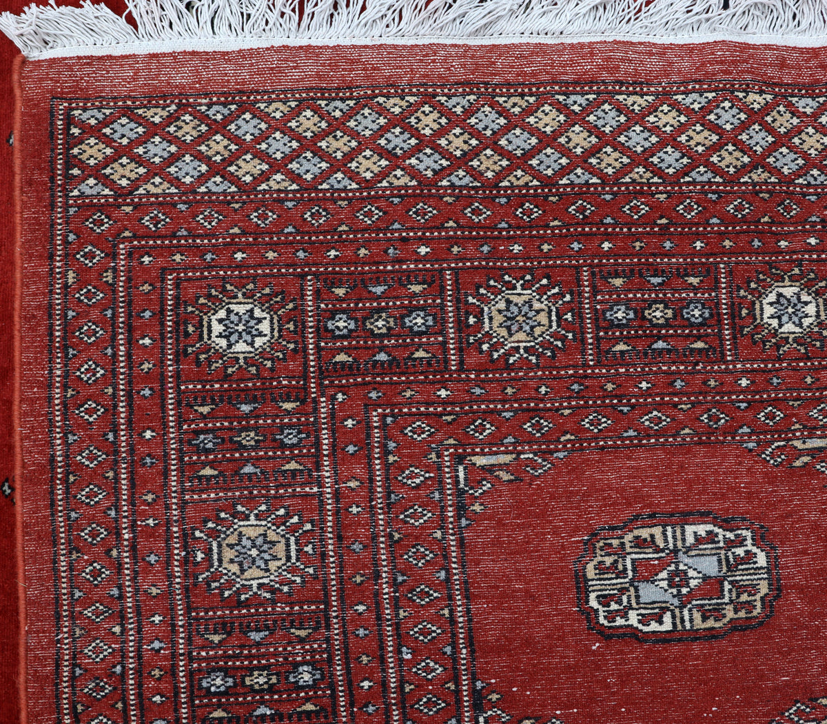 Detail view 7 of red Mori Bokhara handwoven wool rug, 7 x 10 ft