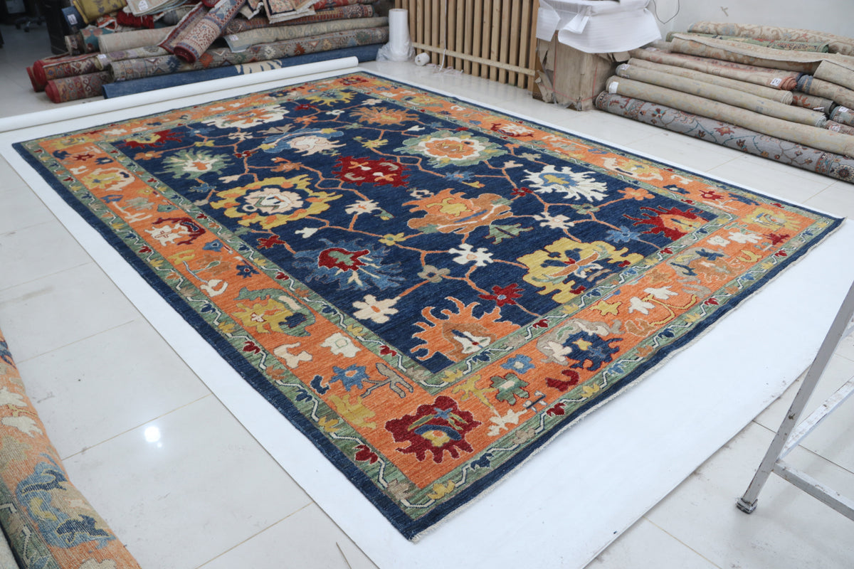 Detail view 2 of blue Oushak handwoven wool rug, 10 x 14 ft