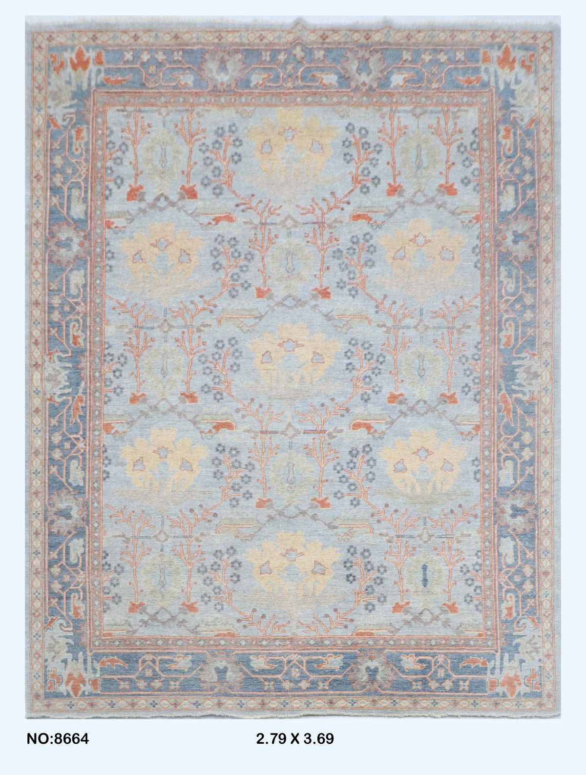 Full view of blue Oushak handwoven wool rug, 9 x 12 ft