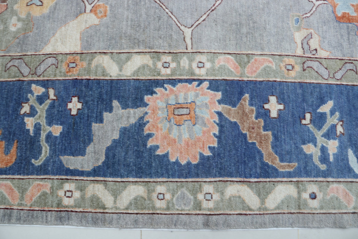 Detail view 3 of blue Oushak handwoven wool rug, 10 x 14 ft